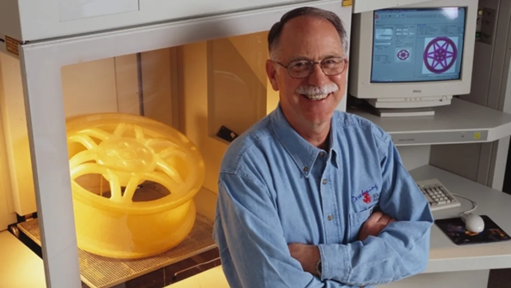Chuck Hull, who pioneered commercial applications of 3D printing, with a 3D printed rim back in the 2000s.